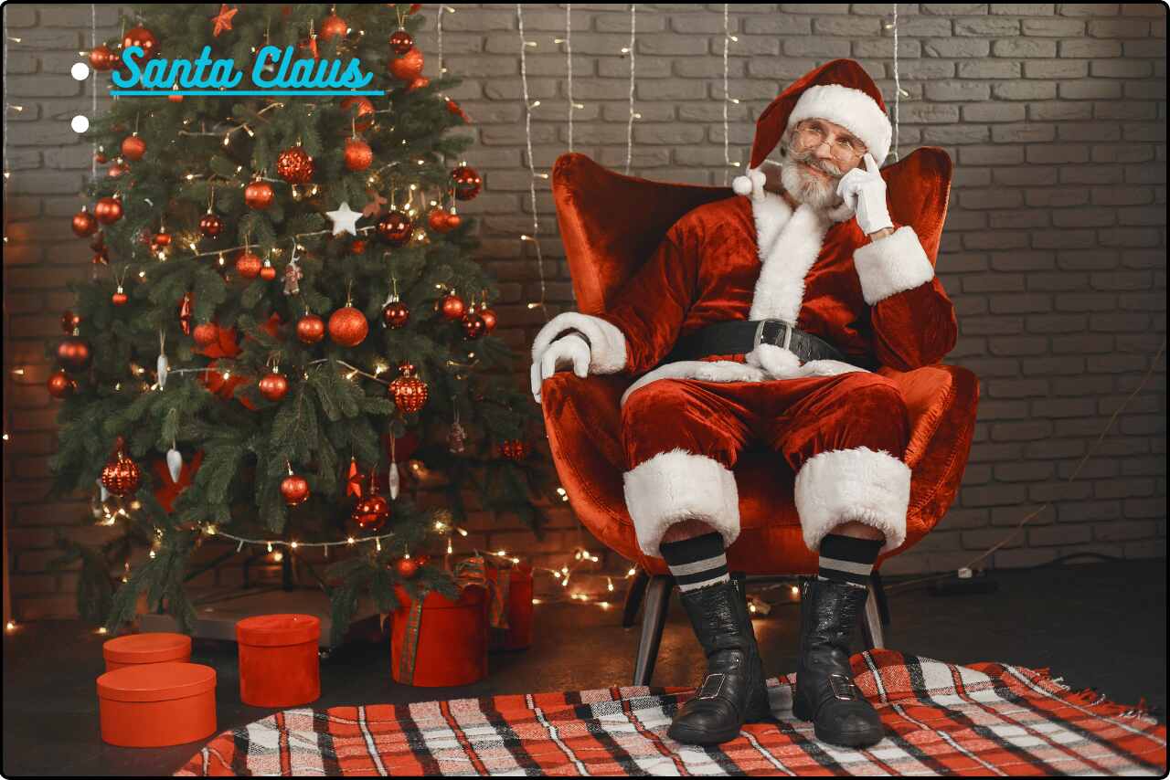 Santa Claus costume worn by a man in a festive sitting room with a Christmas tree.